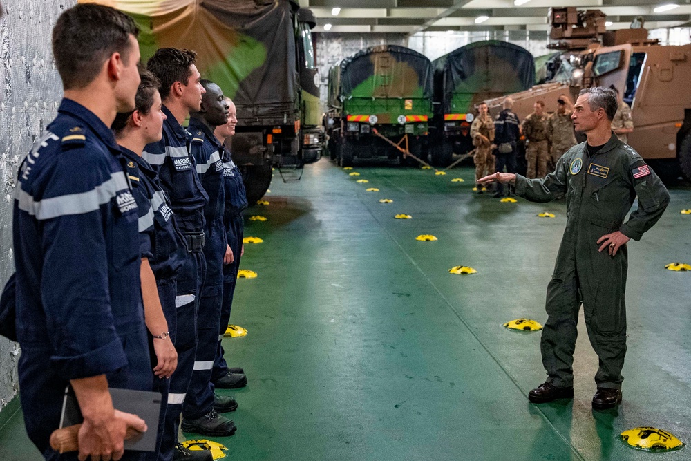 Vice Adm. Doug Perry, commander, U.S. 2nd Fleet, speaks to French midshipmen