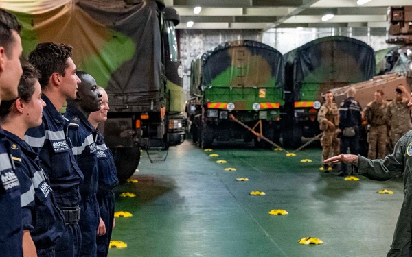 Vice Adm. Doug Perry, commander, U.S. 2nd Fleet, speaks to French midshipmen