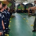 Vice Adm. Doug Perry, commander, U.S. 2nd Fleet, speaks to French midshipmen