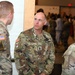 DeCola talks with attendees