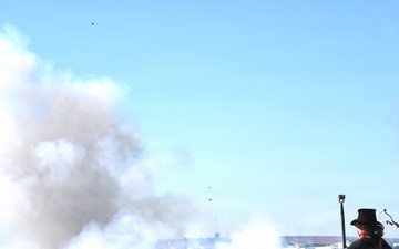USS Arlington receives cannon salute