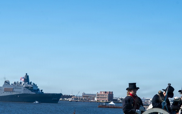USS Arlington receives cannon salute