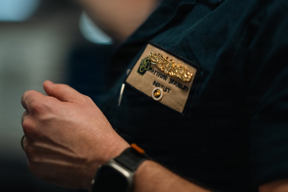 IKE dental surgeon earns warfare pin