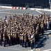 U.S. Marines and Sailors man the rails aboard the USS Arlington (LPD-24)