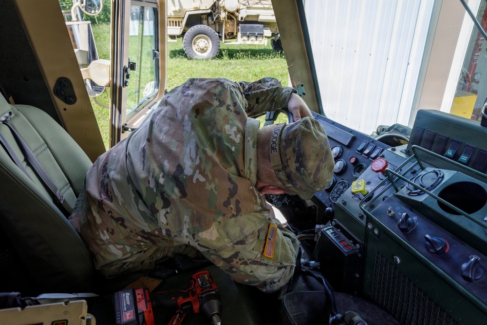 Conducting Vehicle Maintenance at Operation Patriot Press
