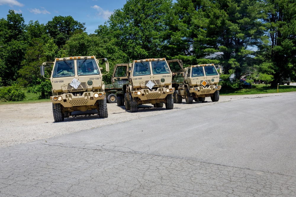 1032nd Vehicles Lined Up at Crane