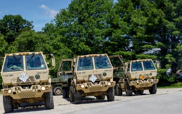 1032nd Vehicles Lined Up at Crane