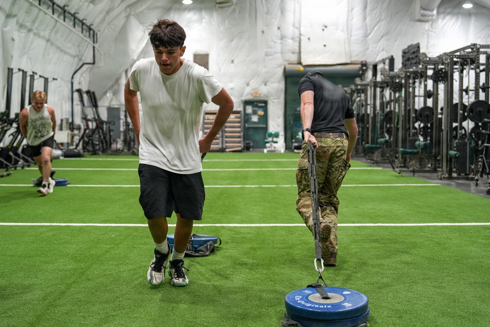 Built by Grit: 10th SFG(A) hosts Football Players for Grit Workout event