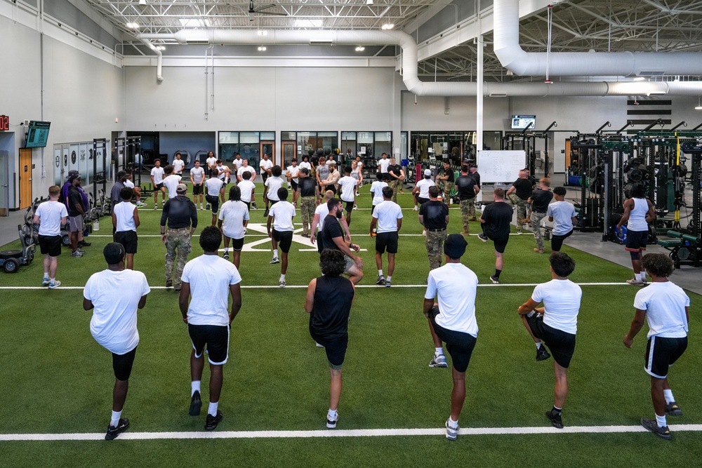 Built by Grit: 10th SFG(A) hosts Football Players for Grit Workout event