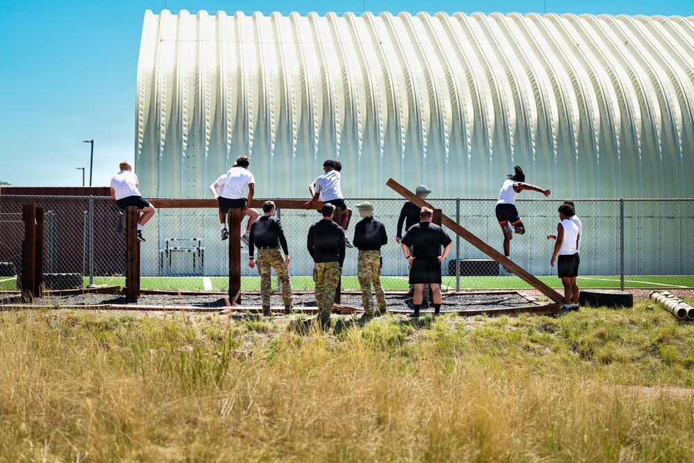 Built by Grit: 10th SFG(A) hosts Football Players for Grit Workout event