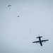 U.S. Navy personnel conduct airborne training over Yokota Air Base