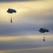U.S. Navy personnel conduct airborne training over Yokota Air Base