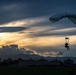 U.S. Navy personnel conduct airborne training over Yokota Air Base