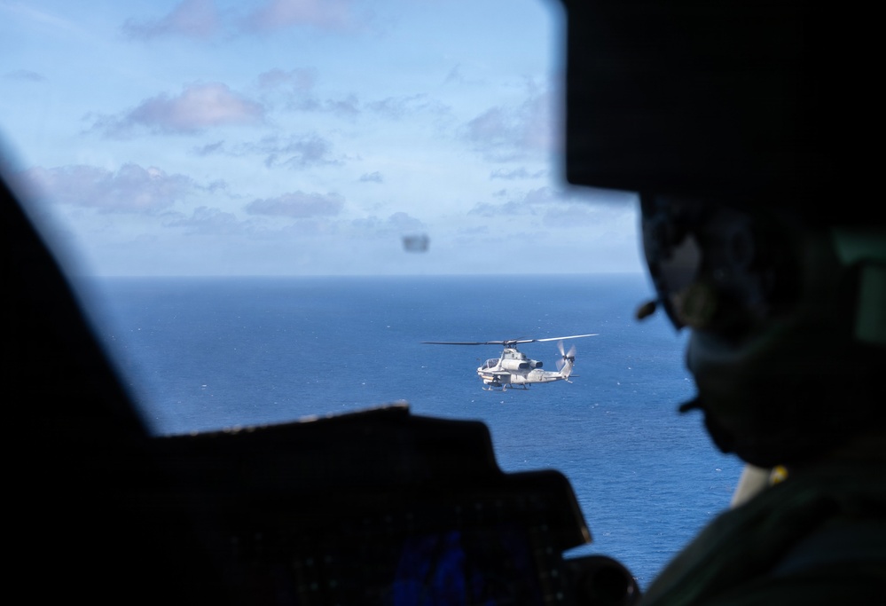 USS Boxer, USS Portland, USNS John L. Canley and USNS Pililaau sail in formation