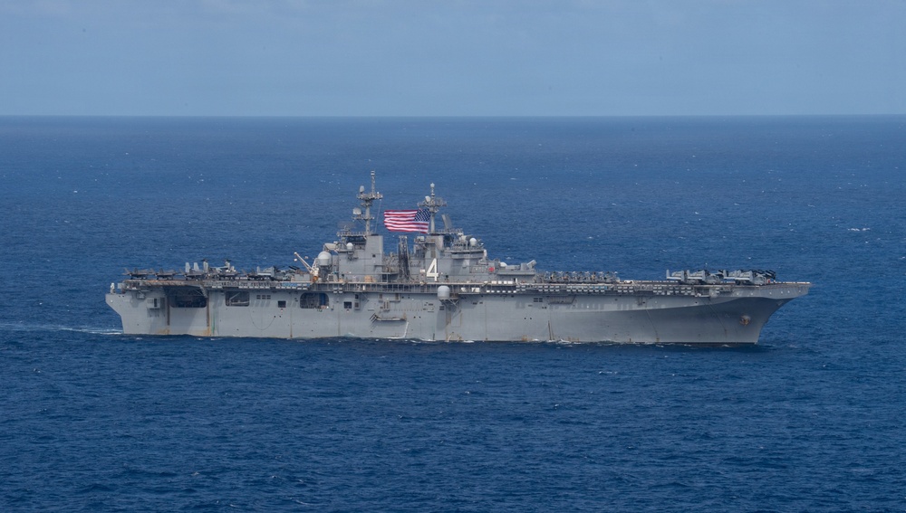 USS Boxer, USS Portland, USNS John L. Canley and USNS Pililaau sail in formation