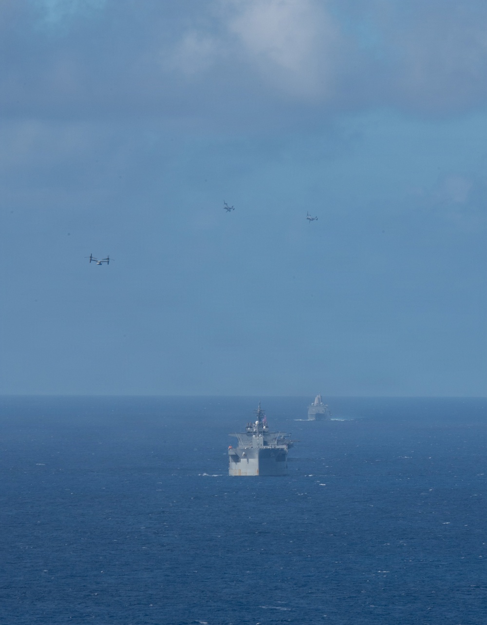 USS Boxer, USS Portland, USNS John L. Canley and USNS Pililaau sail in formation