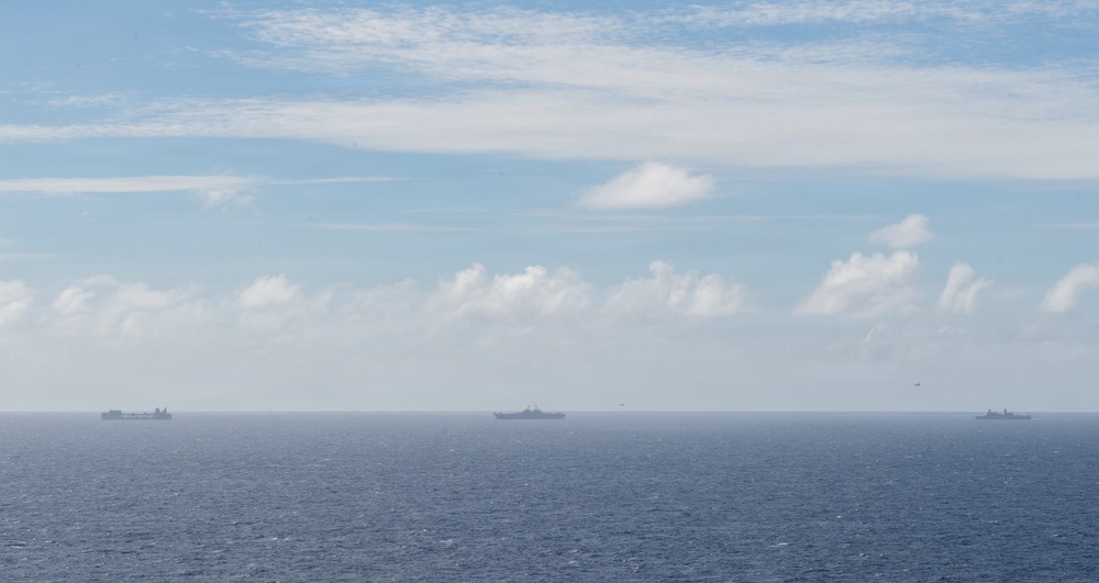 USS Boxer, USS Portland, USNS John L. Canley and USNS Pililaau sail in formation
