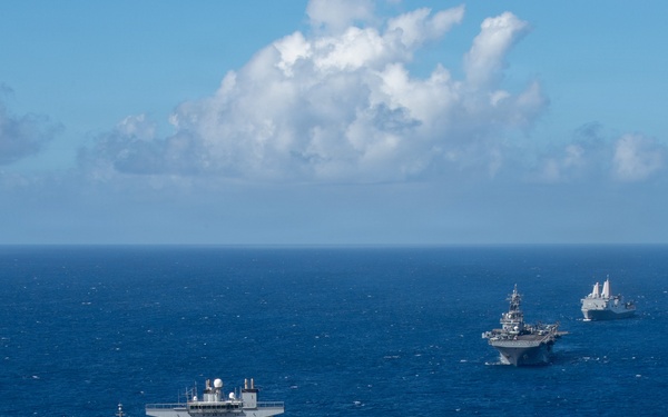 USS Boxer, USS Portland, USNS John L. Canley and USNS Pililaau sail in formation