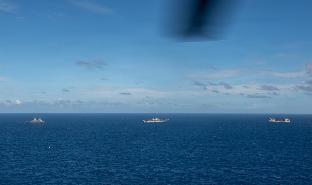 USS Boxer, USS Portland, USNS John L. Canley and USNS Pililaau sail in formation
