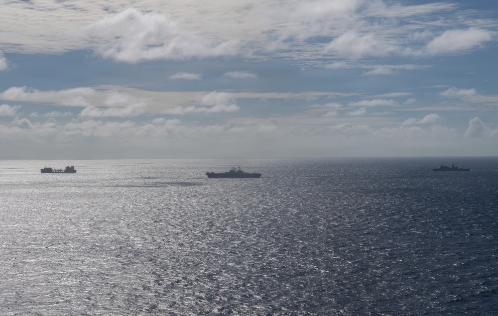USS Boxer, USS Portland, USNS John L. Canley and USNS Pililaau sail in formation