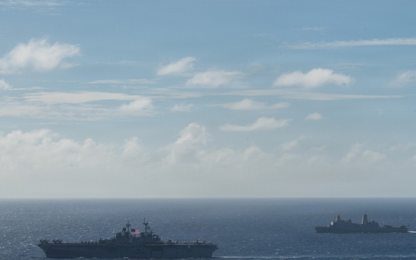 USS Boxer, USS Portland, USNS John L. Canley and USNS Pililaau sail in formation