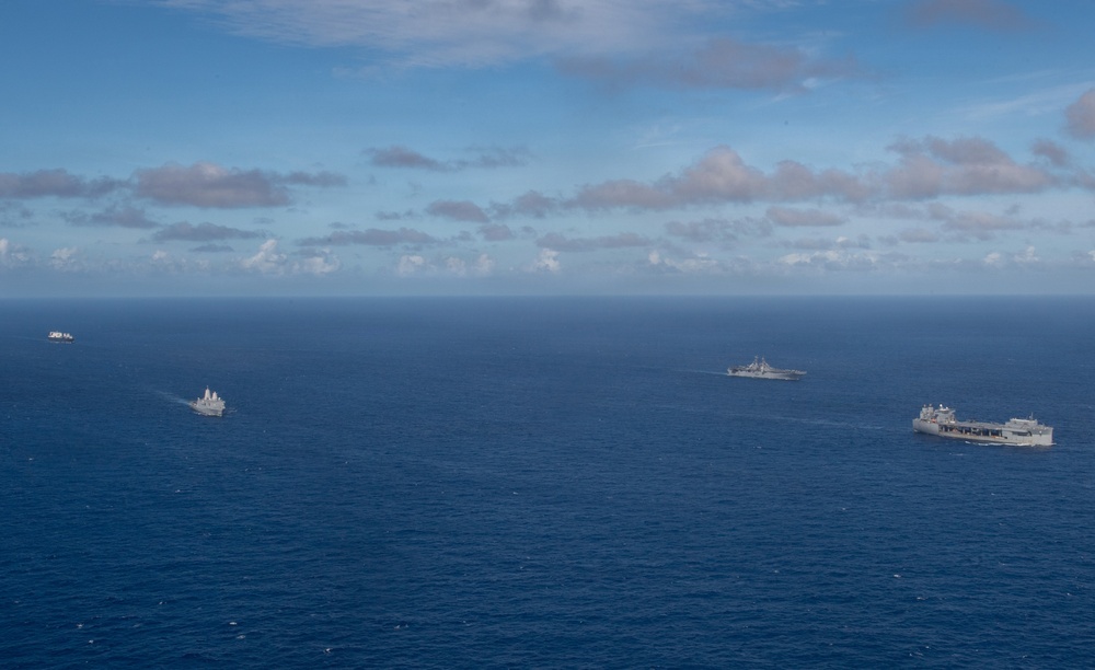 USS Boxer, USS Portland, USNS John L. Canley and USNS Pililaau sail in formation