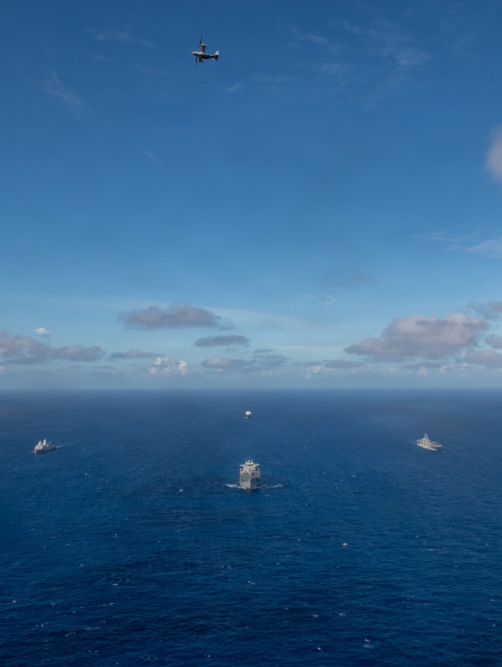 USS Boxer, USS Portland, USNS John L. Canley and USNS Pililaau sail in formation