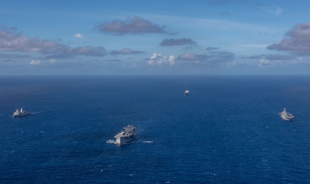 USS Boxer, USS Portland, USNS John L. Canley and USNS Pililaau sail in formation