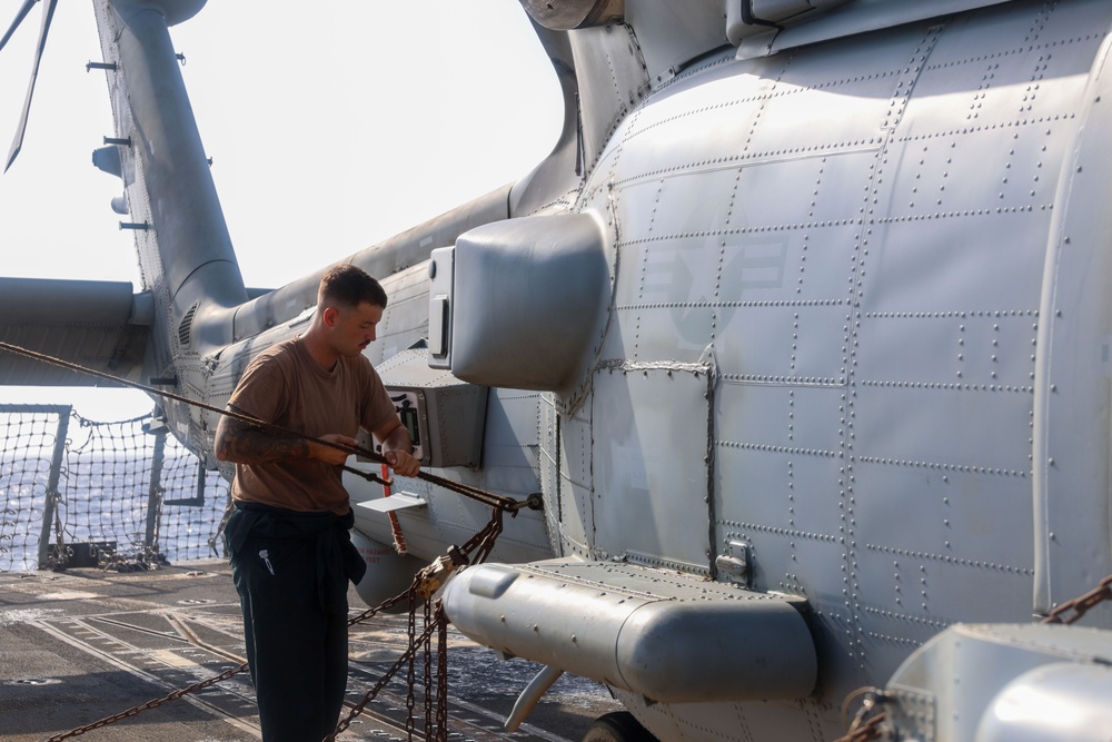 John Finn Conducts Pre-flight Inspections