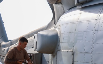 John Finn Conducts Pre-flight Inspections