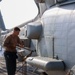 John Finn Conducts Pre-flight Inspections