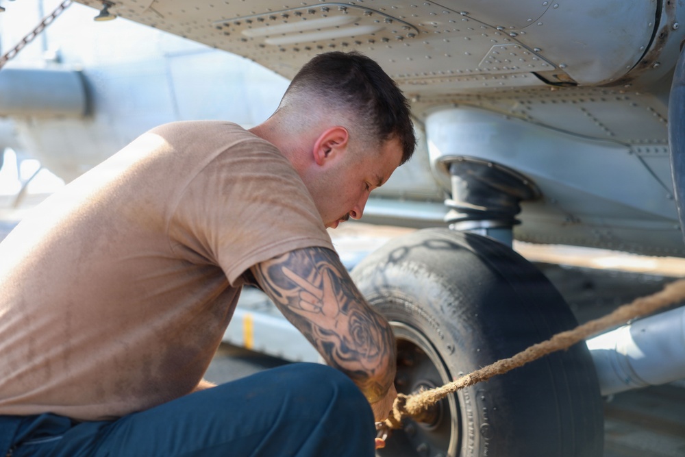 John Finn Conducts Pre-flight Inspections