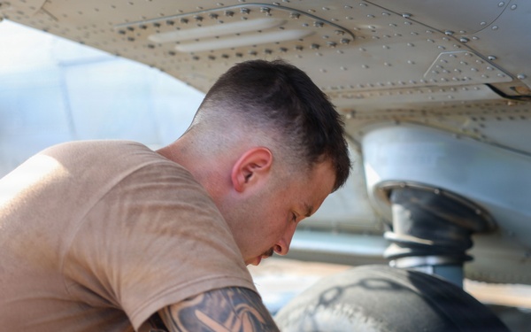 John Finn Conducts Pre-flight Inspections
