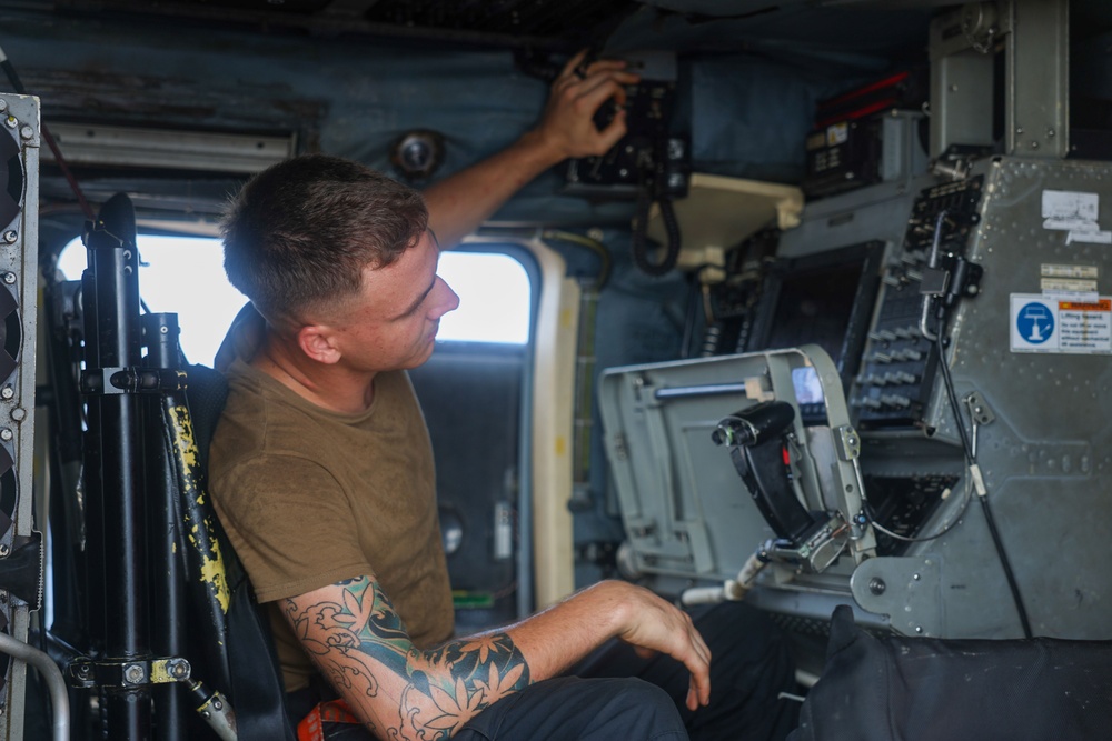 John Finn Conducts Pre-flight Inspections