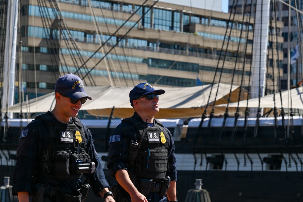 U.S. Coast Guard Maritime Enforcement Specialist's patrolling the baltimore inner harbour during Sail 250 Maryland