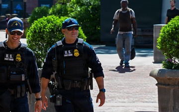 U.S. Coast Guard Maritime Enforcement Specialist's patrolling the baltimore inner harbour during Sail 250 Maryland