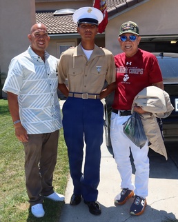 3 generations of Ventura family Marines pose for commemorative photo