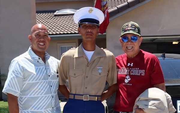 3 generations of Ventura family Marines pose for commemorative photo
