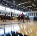 Basketball teams battle for the win