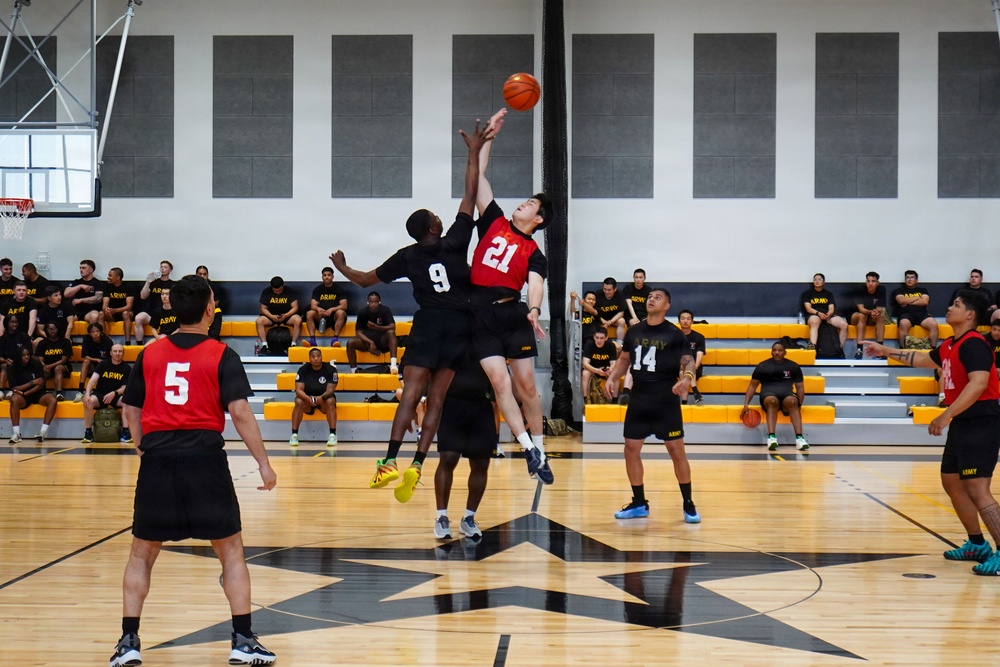Basketball teams battle for the win