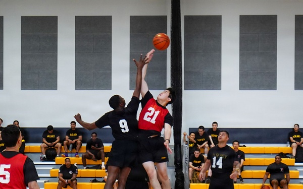 Basketball teams battle for the win