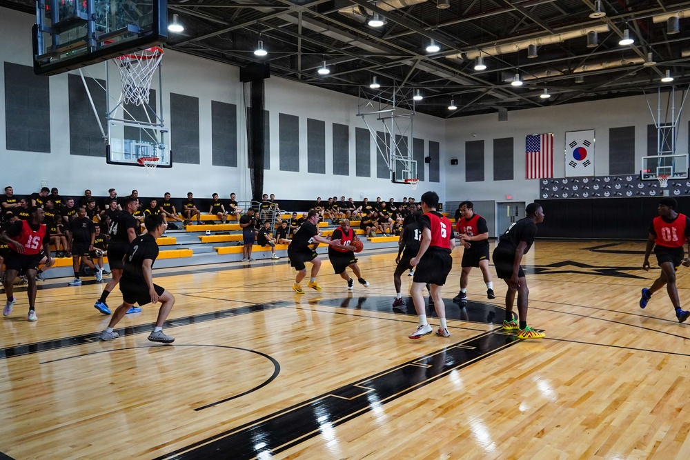 Basketball teams battle for the win