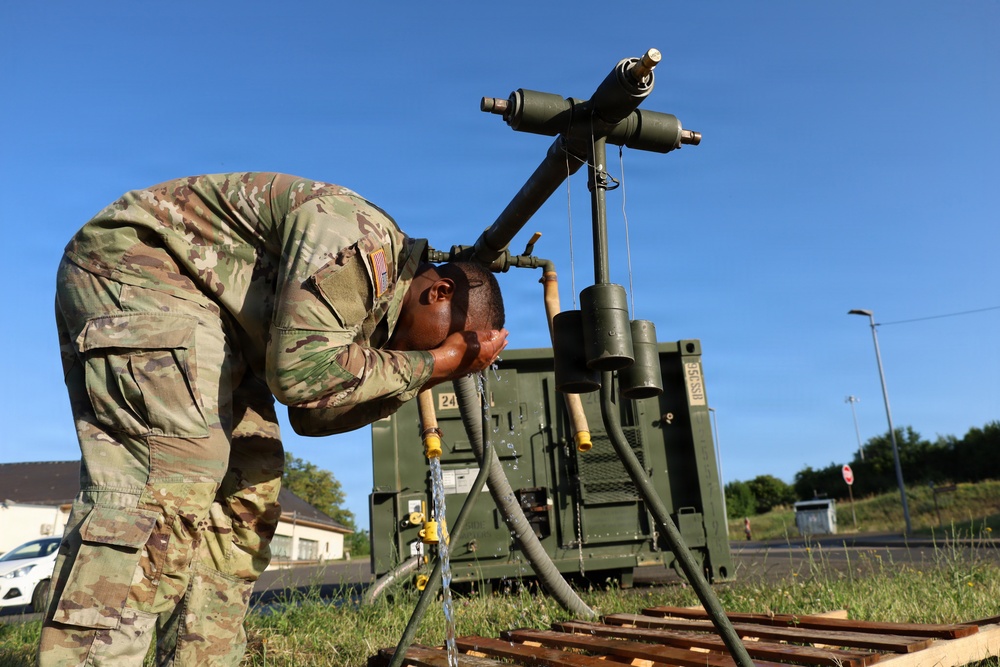 Hydration First: Soldier Tests and Uses Water Point Amid Rising Temperatures
