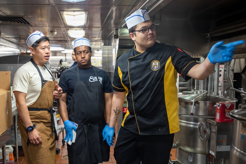 Local Baltimore chefs prepare food for USS Arlington’s (LPD 24) crew during SAIL 250 Maryland &amp; Airshow Baltimore.