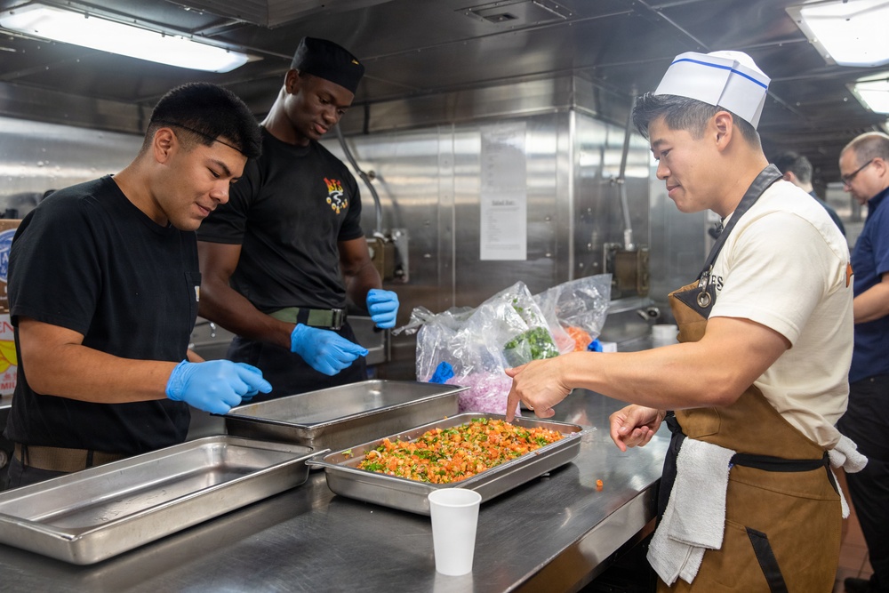 Local Baltimore chefs prepare food for USS Arlington’s (LPD 24) crew during SAIL 250 Maryland &amp; Airshow Baltimore.