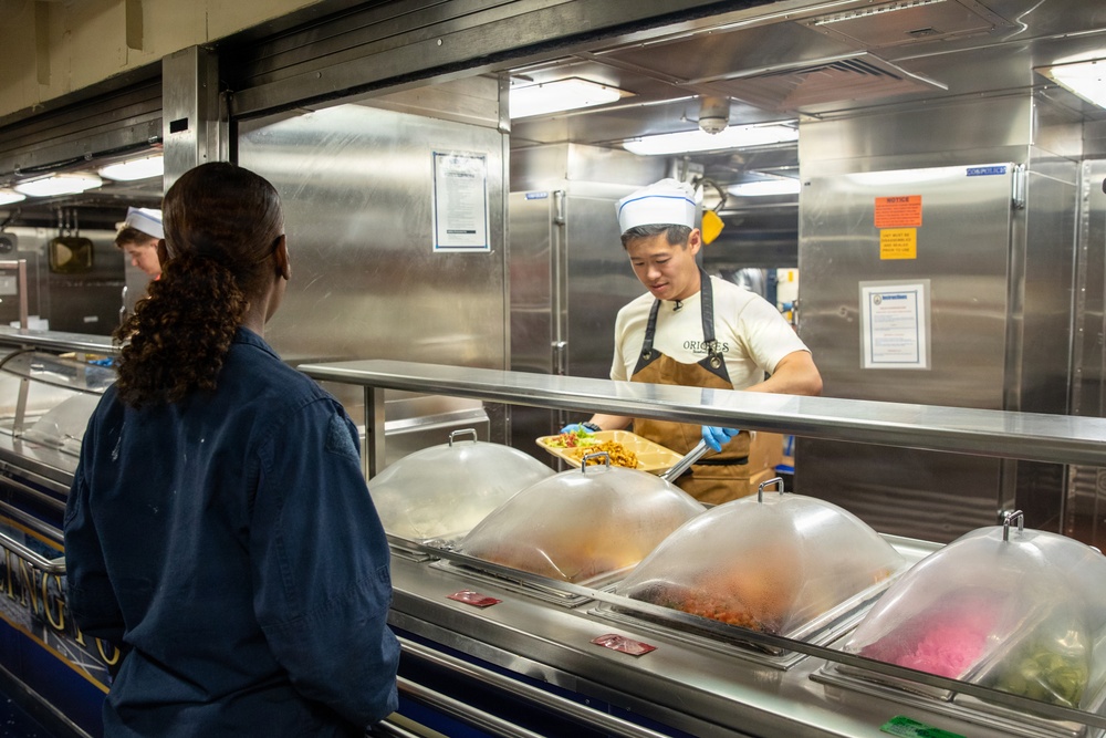 Local Baltimore chefs prepare food for USS Arlington’s (LPD 24) crew during SAIL 250 Maryland &amp; Airshow Baltimore.