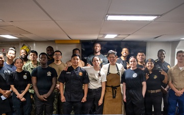 Local Baltimore chefs prepare food for USS Arlington’s (LPD 24) crew during SAIL 250 Maryland &amp; Airshow Baltimore.