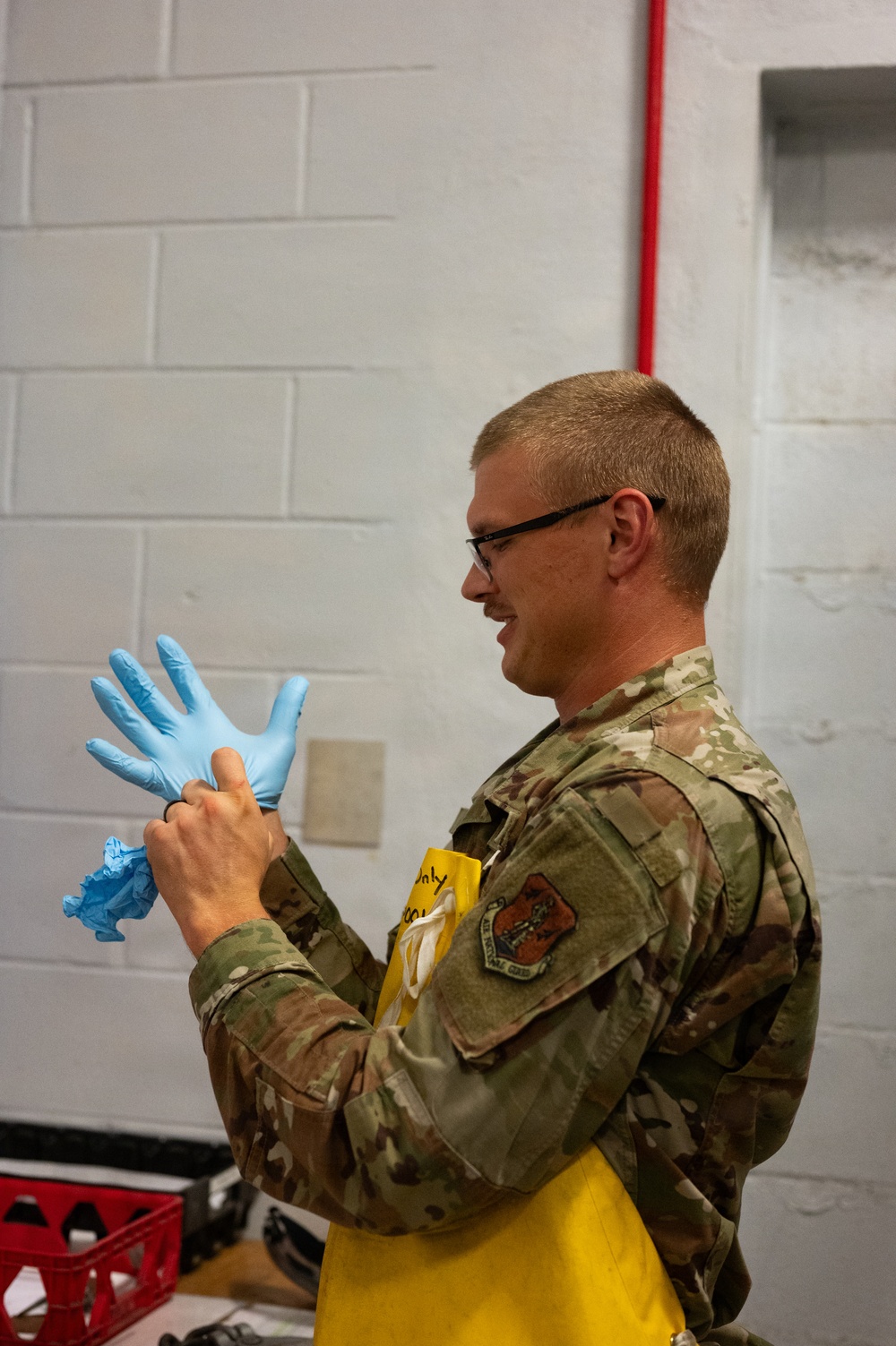Putting on safety gloves