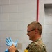 Putting on safety gloves