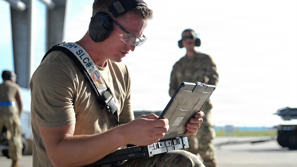 125th Fighter Wing weapons Airmen prepare and load munitions onto F-35A Lightning II aircraft